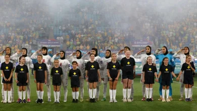 Photo of Iran players salute and sing national anthem at Women’s Asian Cup